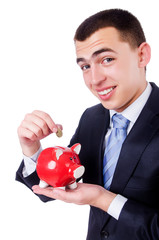 Man with piggybank isolated on white