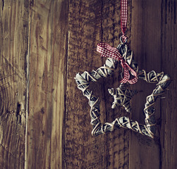 Handmade christmas star on a wooden wall