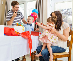 Family Opening Birthday Presents