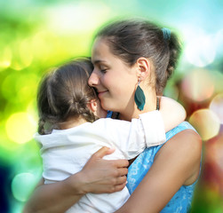 Fototapeta premium Happy family moments - Mother and child have a fun.