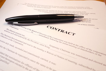 pen lying on a contract