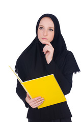 Young muslim student with books on white