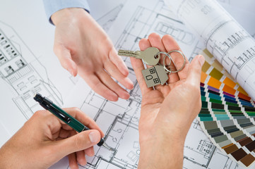 Architect Handing Keys