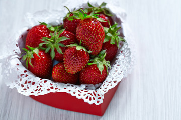 Fresh strawberries in a heart shaped box