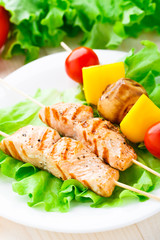 Grilled salmon and vegetable skewers