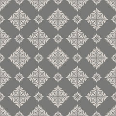 Seamless pattern with floral elements.