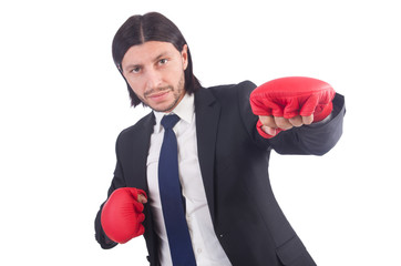 Businessman with boxing gloves on white