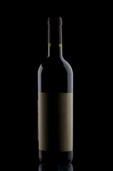 Wine bottle on black background