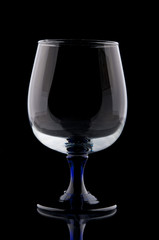 Wineglass closeup on black background