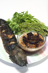 Grilled catfish and tamarind sauce and neem.