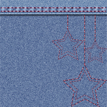 Denim Christmas background with embroidery.