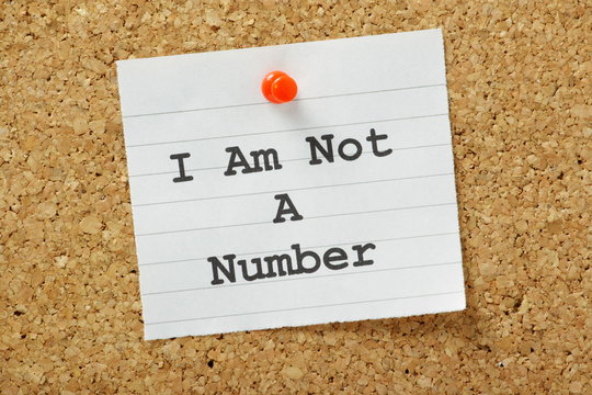 I am not a number concept on a cork notice board