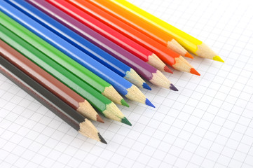 Color pencils on the checked paper