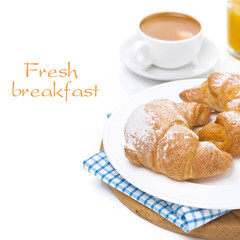 croissants on a plate, espresso and orange juice isolated