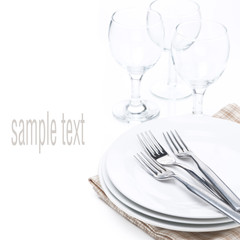 tableware for dinner - plates, forks and glasses, isolated