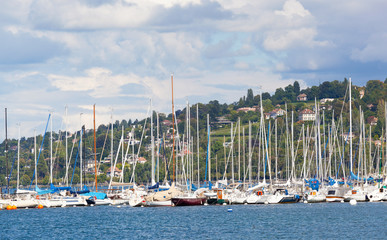 Fototapeta na wymiar Yachts in a marine on Lake Geneva