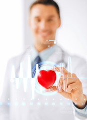 male doctor with heart and cardiogram