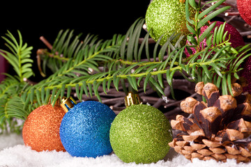 colorful christmas baubles decoration with fir