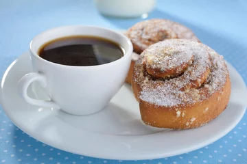 Foto op Canvas Cinnamon buns and coffee © StockphotoVideo