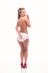 Fototapeta premium Nude sexy woman in pants