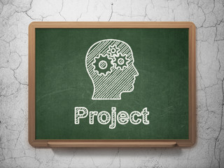 Business concept: Head With Gears and Project on chalkboard