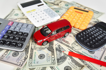 Car money and calculator.