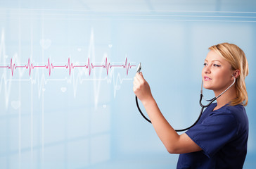 Pretty medical doktor listening to red pulse and heart rates