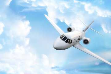 Naklejka na ściany i meble Private business jet with sky background