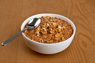 Oatmeal on wooden board. breakfast