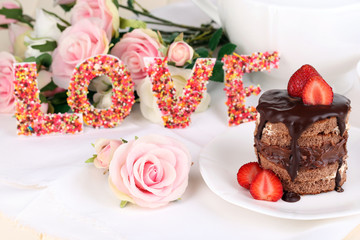 Chocolate cake with strawberry on wooden table close-up