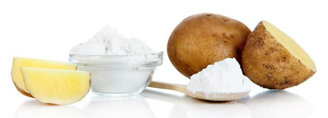 Starch in spoon with potatoes isolated on white