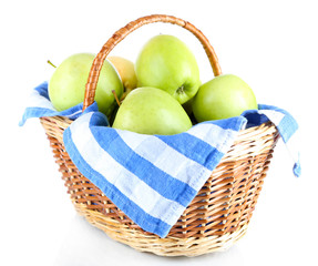 Juicy apples on napkin in basket isolated on white