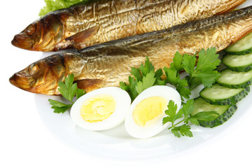 Smoked fish on plate close up