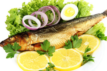 Smoked fish on plate close up