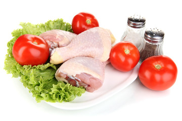 Raw chicken legs isolated on white
