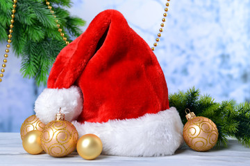 Composition with Santa Claus red hat and Christmas decorations