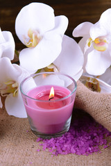 Composition with beautiful colorful candles, sea salt and