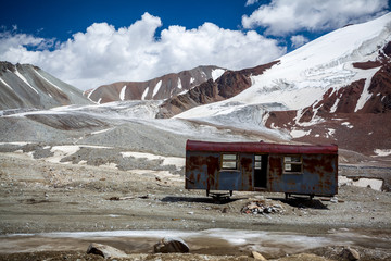 Abandoned trailer in high mountains