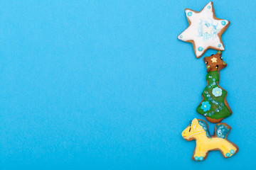 Fototapeta na wymiar Gingerbread cake pony christmas tree star icing decoration