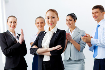 Asian business woman with colleagues
