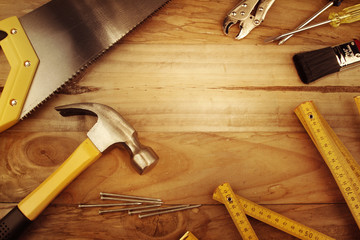 Assorted carpentry work tools on wooden background. Copy space - Powered by Adobe