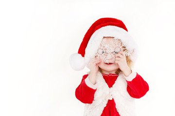 little girl in a cap of Santa Claus isolated on white background