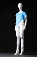 full-length mannequin dressed in fashion shirt and trousers