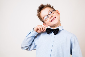 Young happy boy looking at camera.