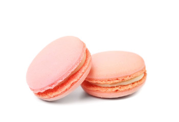Two pink macaron cakes.