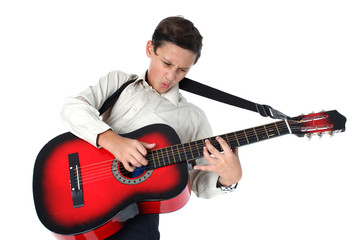 Obraz premium young guitar player performing very passionately on a white back