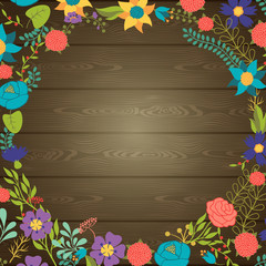 Wood texture background with various flowers.