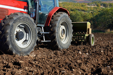 agricultural tractor sowing seeds