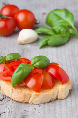 Fresh bruschetta with tomato and basil.
