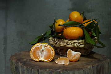 Still life with  tangerines  in  basket